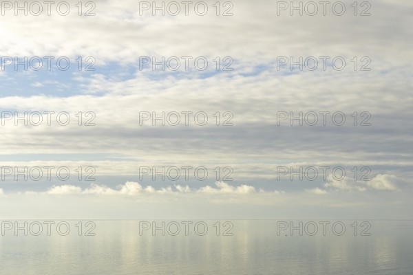 North Sea coast, special light atmosphere over the Wadden Sea with rising water and calm wind,