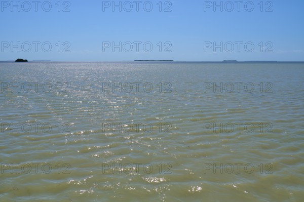 View over the glittering surface of the sea under a clear sky, Flamingo, Everglades National Park,