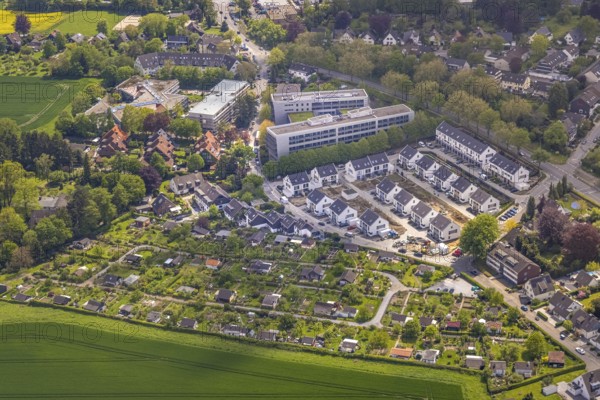 Aerial view, airport housing estate, building site and new building housing estate