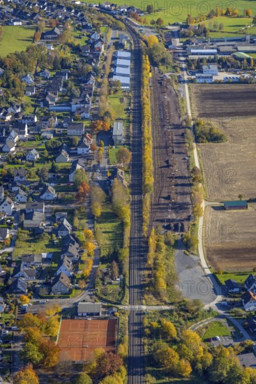 Aerial view, sawmill timber yard at the railway embankment in the district Wennemen in Meschede,