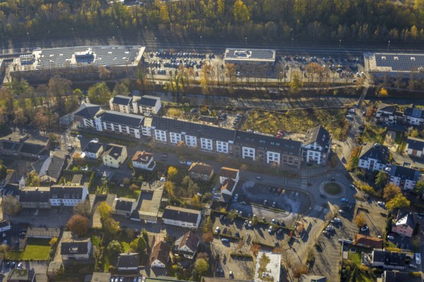 Aerial view, residential area and shopping centre Untere Promenade at the river Hönne in Menden,