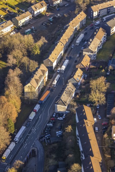 Aerial view, through road with truck traffic jam on the Lennestraße at the exit Lüdenscheid of the