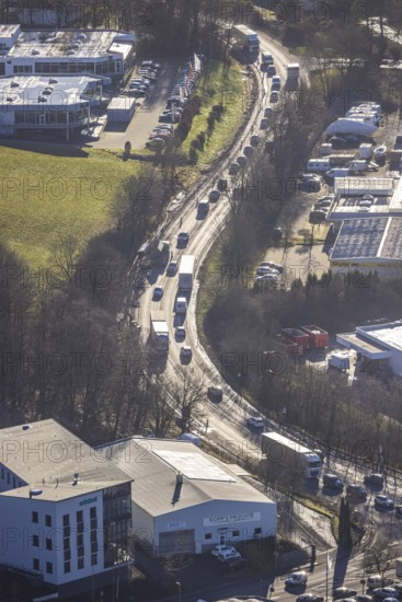 Aerial view, truck traffic jam and diversion traffic with local through traffic due to the closed