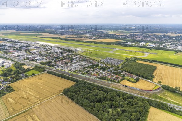 Aerial view, Dortmund Airport, residential area and commercial area Chaussee with noise protection