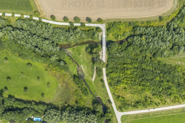 Aerial view, foot and cycle path Seseke-Weg with bridge over the river Seseke in the district