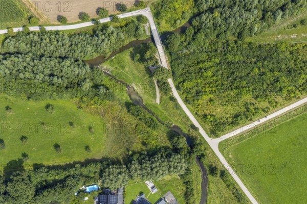 Aerial view, foot and cycle path Seseke-Weg with bridge over the river Seseke in the district