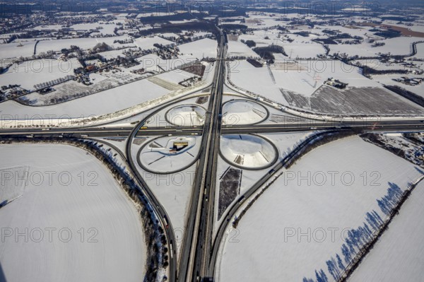 Aerial view, Kamen junction in winter, A1 and A2, helicopter sculpture Yellow Angel, Kamen, Ruhr