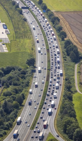 Aerial photo, traffic volume on the A1 motorway in Südkamen, truck traffic jam, Kamen, Ruhr area,