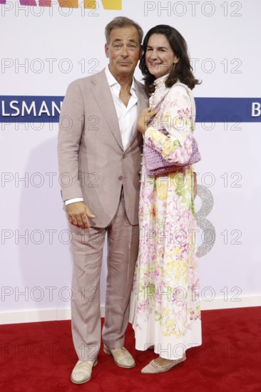 Jan Sosniok and his woman Nadine arriving at the Bertelsmann Summer Party 2025 at the Bertelsmann