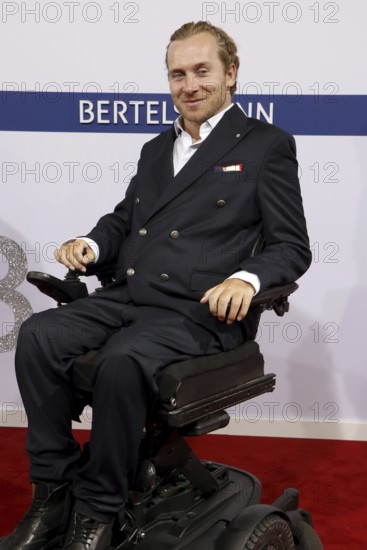Samuel Koch arriving at the Bertelsmann Summer Party 2025 at the Bertelsmann Representative Office