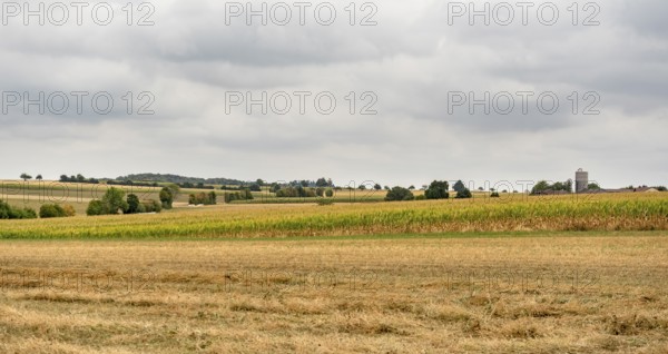 Stormy farmland scenery in Hohenlohe, an area in Southern Germany at late summer time