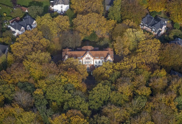 Aerial view, music school of the city of Gladbeck in the autumnal forest in the district Rentfort