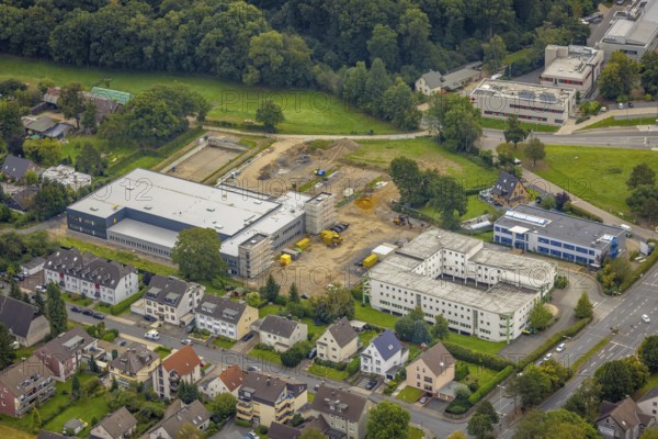 Aerial view, construction site and new construction of a manufactory commissioning area