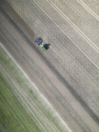 Field work, tractor, ploughing, cultivating, sowing peas, fertilising, agricultural work,