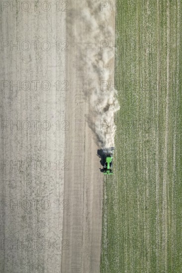 Field work, tractor, ploughing, cultivating, sowing peas, fertilising, dryness, drought,