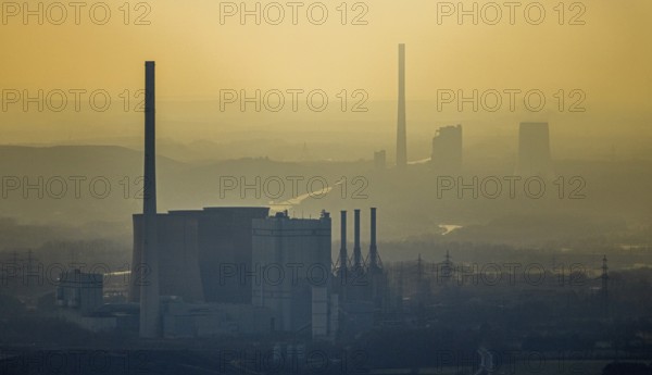 Aerial view of RWE Power AG power plant Gersteinwerk in backlight and STEAG power plant Bergkamen