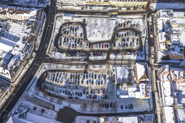 Aerial view, car park Santa-Monica-Platz, location former synagogue, parked cars in the snow,