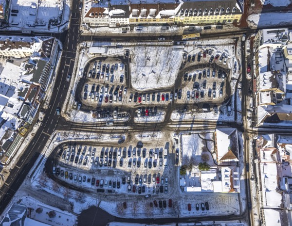 Aerial view, car park Santa-Monica-Platz, location former synagogue, parked cars in the snow,