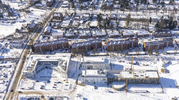 Aerial view, snow, winter, construction area Paracelsuspark with innovation centre, SCI:Q Science