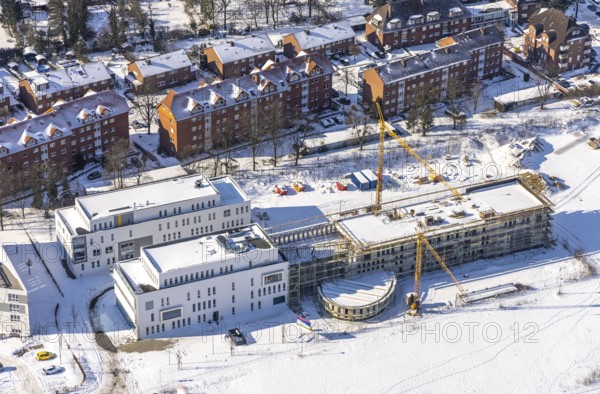 Aerial view, snow, winter, construction area Paracelsuspark with innovation centre, SCI:Q Science