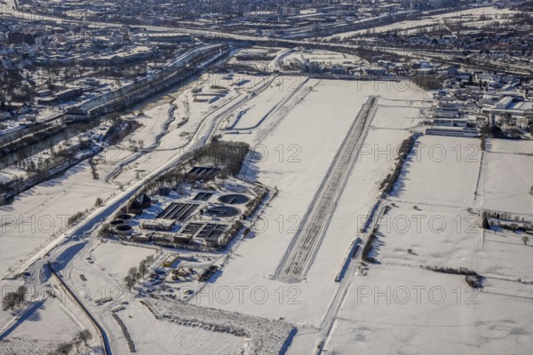 Aerial photo, EDLH airfield in the snow with cleared runway, Mattenbecke sewage treatment plant,