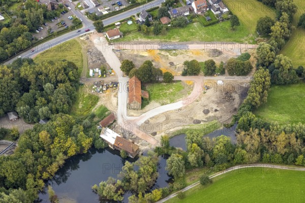 Aerial view, construction site and renovation of the Schlossmühle am Mühlengraben am Mühlenteich in