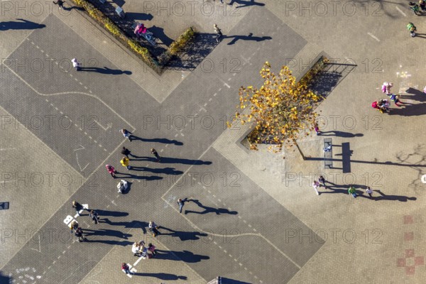 Aerial view, Overbergschule and pupils and cross on the schoolyard in the district Bockum-Hövel in