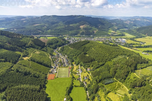Aerial view, forest area and tennis courts with youth training, sports field Rönkhausen,