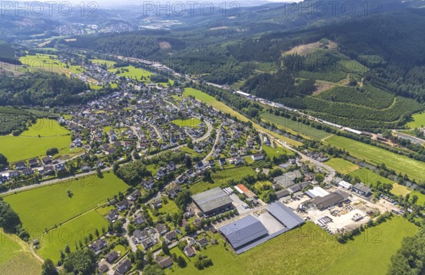 Aerial view, commercial area Bahnhofstraße at the edge of the forest on the Lenne and commercial