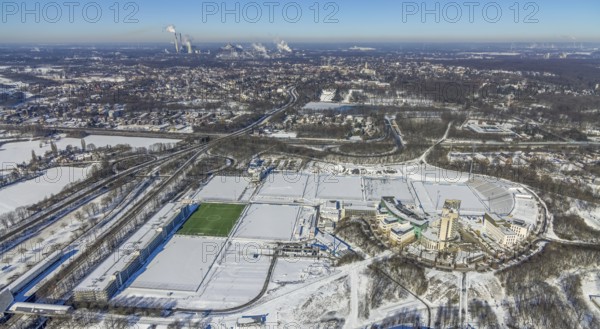 Aerial view, training ground and park stadium in the snow at the Veltins-Arena, Hotel Courtyard by