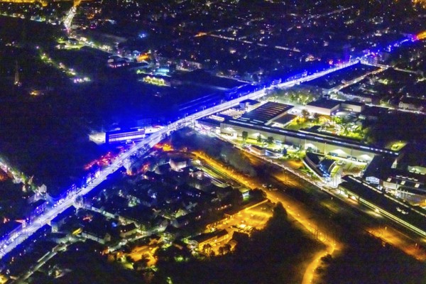 Aerial view, lighting in Schalke blue, Schalke 04, Kurt-Schumacher Straße with thyssenkrupp