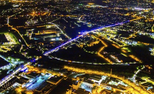 Aerial view, lighting in Schalke blue, Schalke 04, Kurt-Schumacher Straße with thyssenkrupp