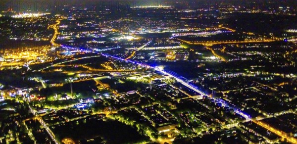 Aerial view, illumination in Schalke blue, Schalke 04, Kurt-Schumacher Straße with thyssenkrupp