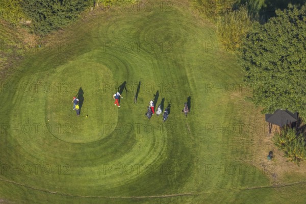 Aerial view, golf course golf club Schloss Horst and golf player on the green in the district Horst