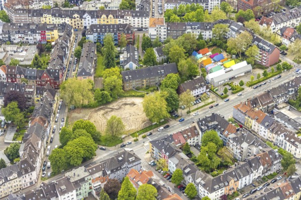 Aerial view, fallow land at Franziskastraße, catholic kindergarten St. Ludgerus with colourful