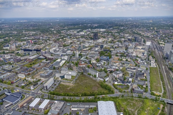 Aerial view, brownfield Schwanenkampstraße, construction site and new office building at the corner