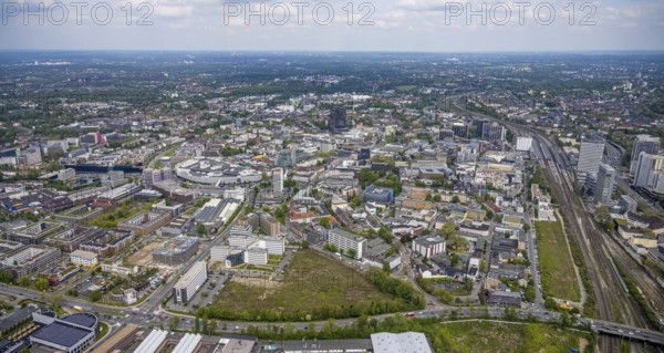Aerial view, brownfield Schwanenkampstraße, construction site and new office building at the corner