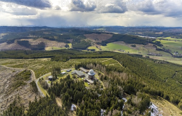 Aerial view, forest damage in a restricted military area, radar dome and radar station on Mount
