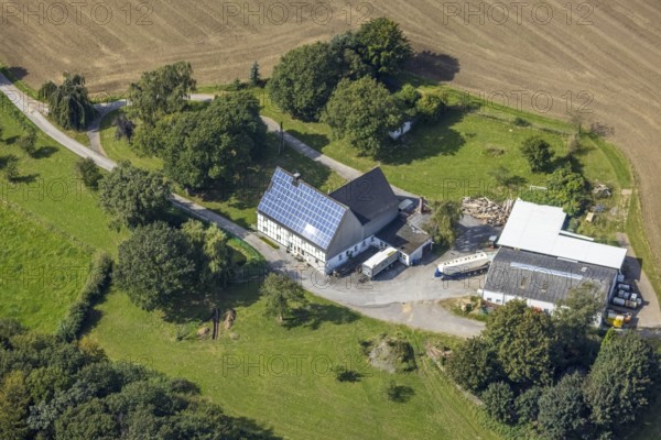 Aerial view, half-timbered house with solar roof in Oberhülsenbecke in the district Rüggeberg in