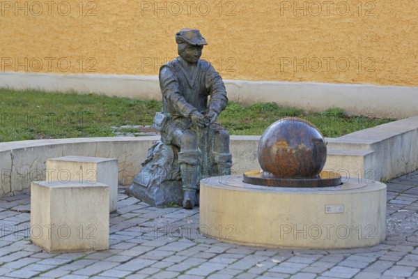 Monument to founder David Strickermann, town history on the development of the textile industry,