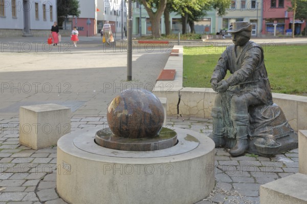 Monument to founder David Strickermann, town history on the development of the textile industry,