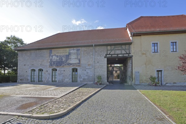 Castle built 16th century with banner for the celebration and anniversary of the bell, city