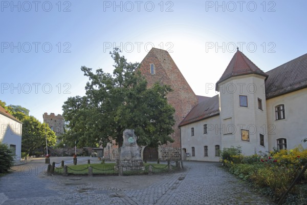 Inner courtyard of the Francisceum built in the 13th century in backlight, former Franciscan