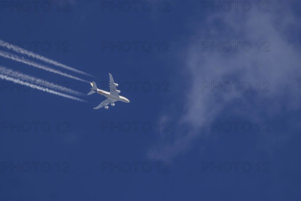 Aircraft in the sky at cruising altitude. Airbus A380 of the airline Ethihad en route to Abu Dhabi.