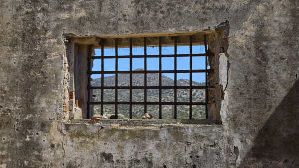 View through a barred window onto a mountain landscape, Old Silk Factory, German Wehrmacht military