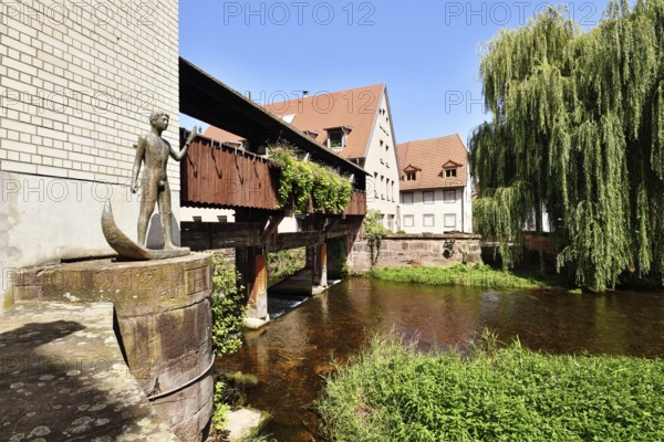 Ettlingen, Germany - August 13th 2025: Historic old town of Ettlingen Germany with wooden bridge