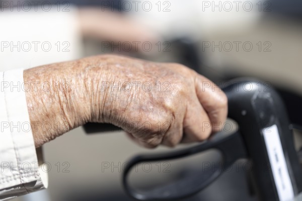 Close-up of wrinkled hands of a 90+ year old senior citizen in a retirement home, Cologne, North