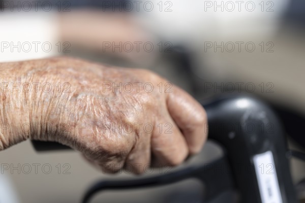 Close-up of wrinkled hands of a 90+ year old senior citizen in a retirement home, Cologne, North