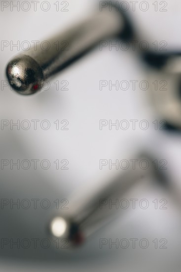Close-up of a power plug, Schuko plug, with focus on the contact pins, symbol image for,