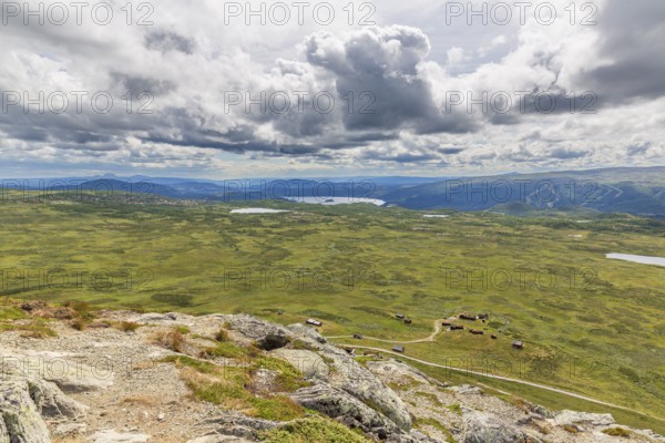 Gravel road through Jotunheimen National Park, view from Smørkollen mountain, Beitostølen,